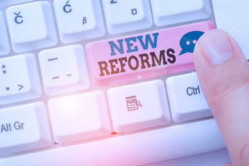 Text sign showing New Reforms. Business photo showcasing to amend or improve by change of form or...