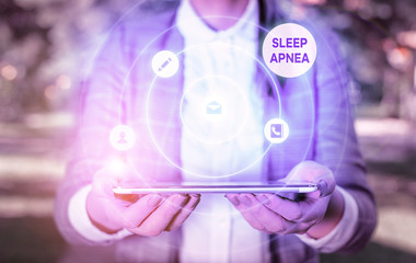 Writing note showing Sleep Apnea. Business concept for disorder which demonstrating repeatedly stop...