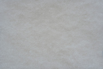 Surface texture of white parchment paper, background.