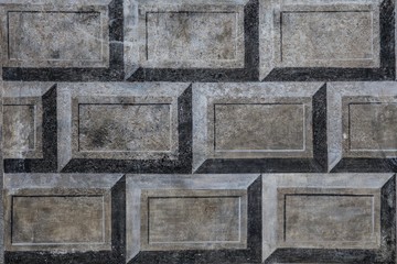 Beautiful painted facade decoration on a castle wall. grunge look.