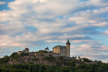 Fototapeta na wymiar castle Kuneticka Hora at sunset