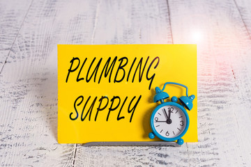 Writing note showing Plumbing Supply. Business concept for tubes or pipes connect plumbing fixtures...