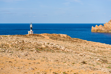 Fototapeta na wymiar Rocky coast and sea view on Minorca island. Fornells cape.Baleares, Spain