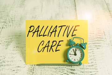 Writing note showing Palliative Care. Business concept for specialized medical care for showing...