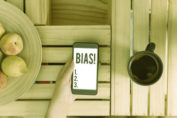 Text sign showing Bias. Business photo showcasing inclination or prejudice for or against one...