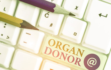 Text sign showing Organ Donor. Business photo showcasing the act of donating an organ to a...