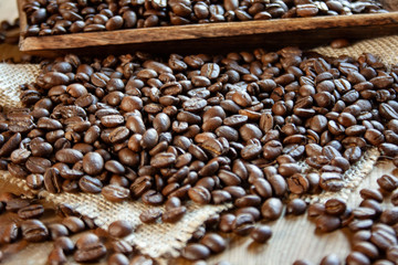 Coffee beans scattered on the fabric