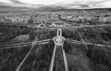 Varna, Bulgaria - February 11, 2020: Panoramic aerial view from the sea garden to The Pantheon of the Fallen of the Wars and Palace of Culture and Sport. - obrazy, fototapety, plakaty