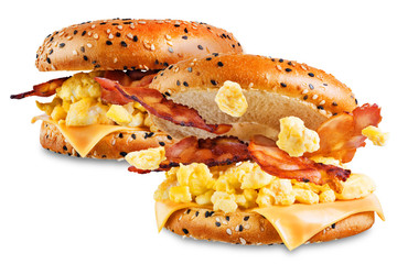 Fried bacon cheese egg salad bagel on a white isolated background