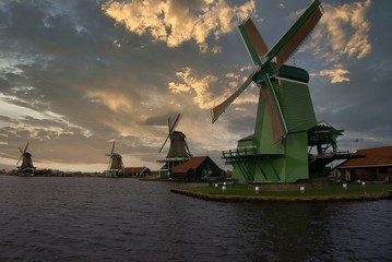 Fototapeta na wymiar Dynamic windmills in holland