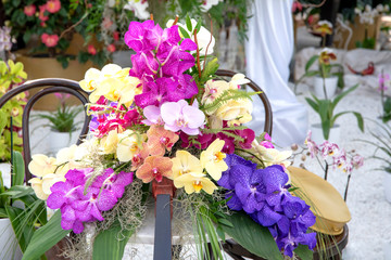 Obraz na płótnie Canvas Beautiful flower arrangement with orchids different colors
