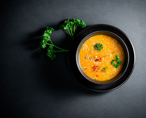 Delicious vegetable potato soup served in a bowl