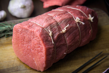 raw eye of round beef for roast beef with butcher’s knot