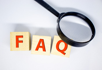concept of FAQ word on wooden colorful cubes