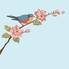 A small beautiful songbird sits on a branch with a flower.