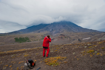 Photographer shoots Koryak volcano in the clouds.