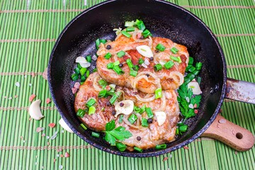 Fried meat in the pan. Delicious meat food . 