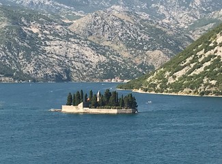 Island of St. George, one of two islet landmarks on Kotor Bay in Perast, Montenegro - 326186816