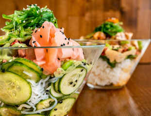 Hawaiian tuna salmon marlin wakame sesame soy cucumber avocado rice poke bowl
