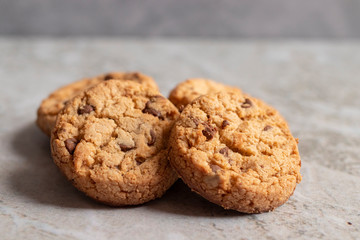 Freshly baked cookies placed on marbled texture