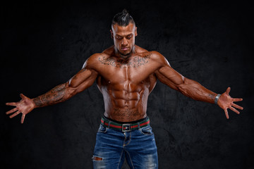 Obraz premium Hnadsome Shirtless Muscular Men in Jeans Posing