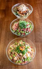 Hawaiian tuna salmon marlin wakame sesame soy cucumber avocado rice poke bowl