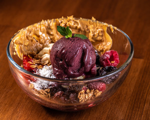 Acai bowl blueberry raspberry mint coconut peanut butter vegan food 