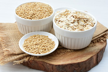 Oat grains and flakes in containers for display