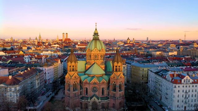 Aerial Munich skyline view from above, drone viewo fly over old town marienplatz town hall and most popular church in munchen germany.
