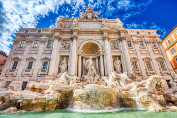 Fototapeta na wymiar Illuminated Fontana Di Trevi, Trevi Fountain during a Sunny Day, Rome