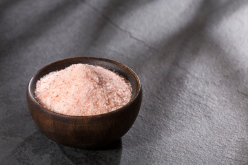 Fine grains of pink Himalayan salt, powder red rock salt from Pakistan