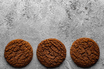 Chocolate chip cookies on dark old wooden table with place for text., freshly baked. Selective Focus with Copy space.
