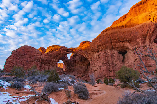 Double Arch as the Sun Sets © Larry