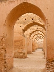Arches in Imperial Royal Stables in Meknes, Morocco