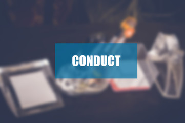 Conduct word with blurring business background