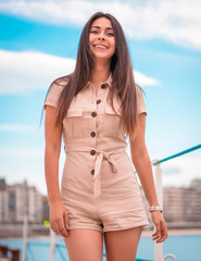 Street Style, a happy brunette in a photo shoot