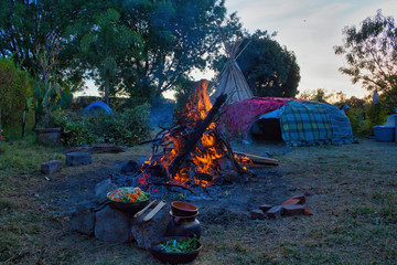 Temazcal, preparation for ritual,Traditional native sweat lodge with hot stones © Nailotl