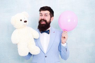Greetings 8 march. Celebrate love. Valentines day. Romantic man with teddy bear and air balloon...