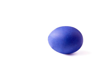 Easter dark blue egg  isolated on white background .