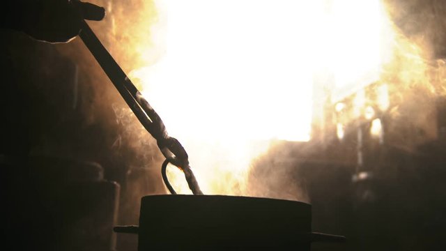 Steam comes off the hot blade after forging