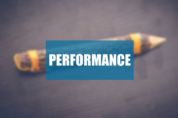 Performance word with blurring business background
