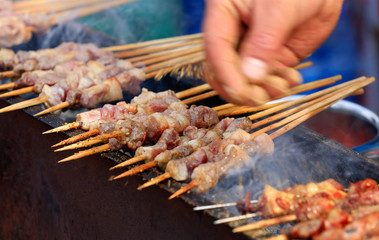 Close-up of lamb kebabs, outdoors,