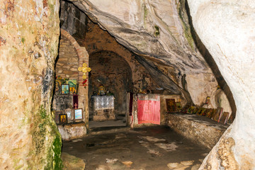Fototapeta na wymiar Inside the monastery enclosed by Davelis cave