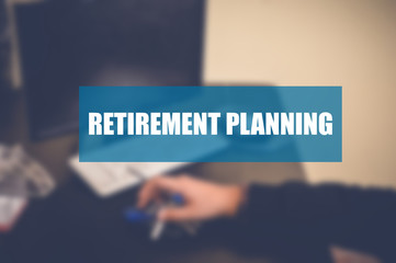 Retirement planning word with blurring business background