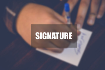 Signature word with blurring business background