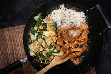 Beancurd knots vegan stirfry with bok choy, enokitake and rice vermicelli