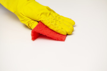 Close Up cleaning company worker hand holding sponge