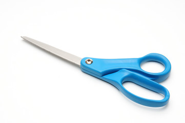 Tailors scissors on a white background