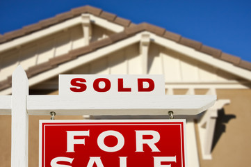 Sold Home For Sale Real Estate Sign and House