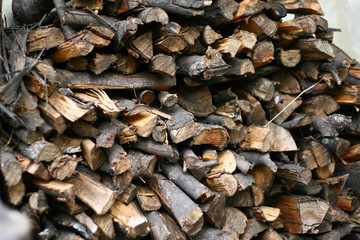 small logs stacked on top of each other
